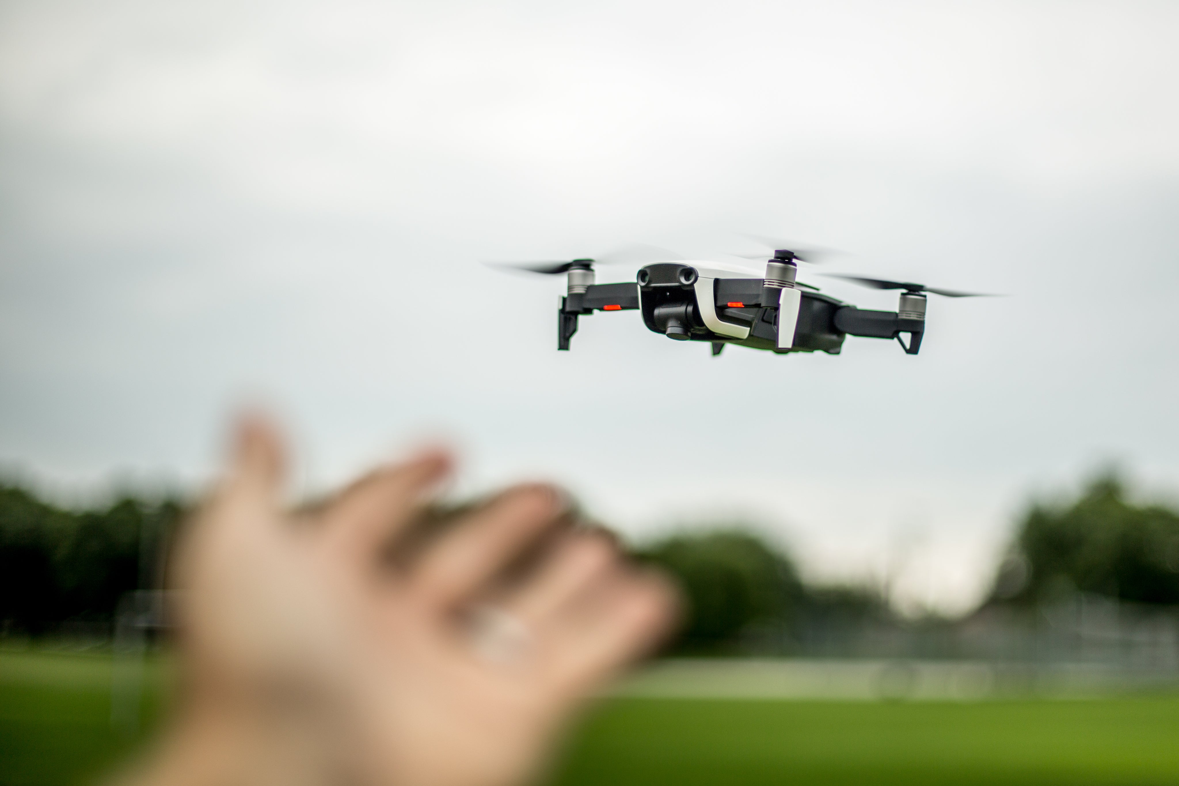 files/hand-reaching-out-to-drone.jpg